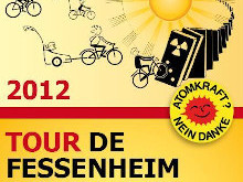 Plakat der Tour de Fessenheim 2012, oberer Teil - Grafik: Anti-Atom-Gruppe Freiburg - Creative-Commons-Lizenz Namensnennung Nicht-Kommerziell 3.0